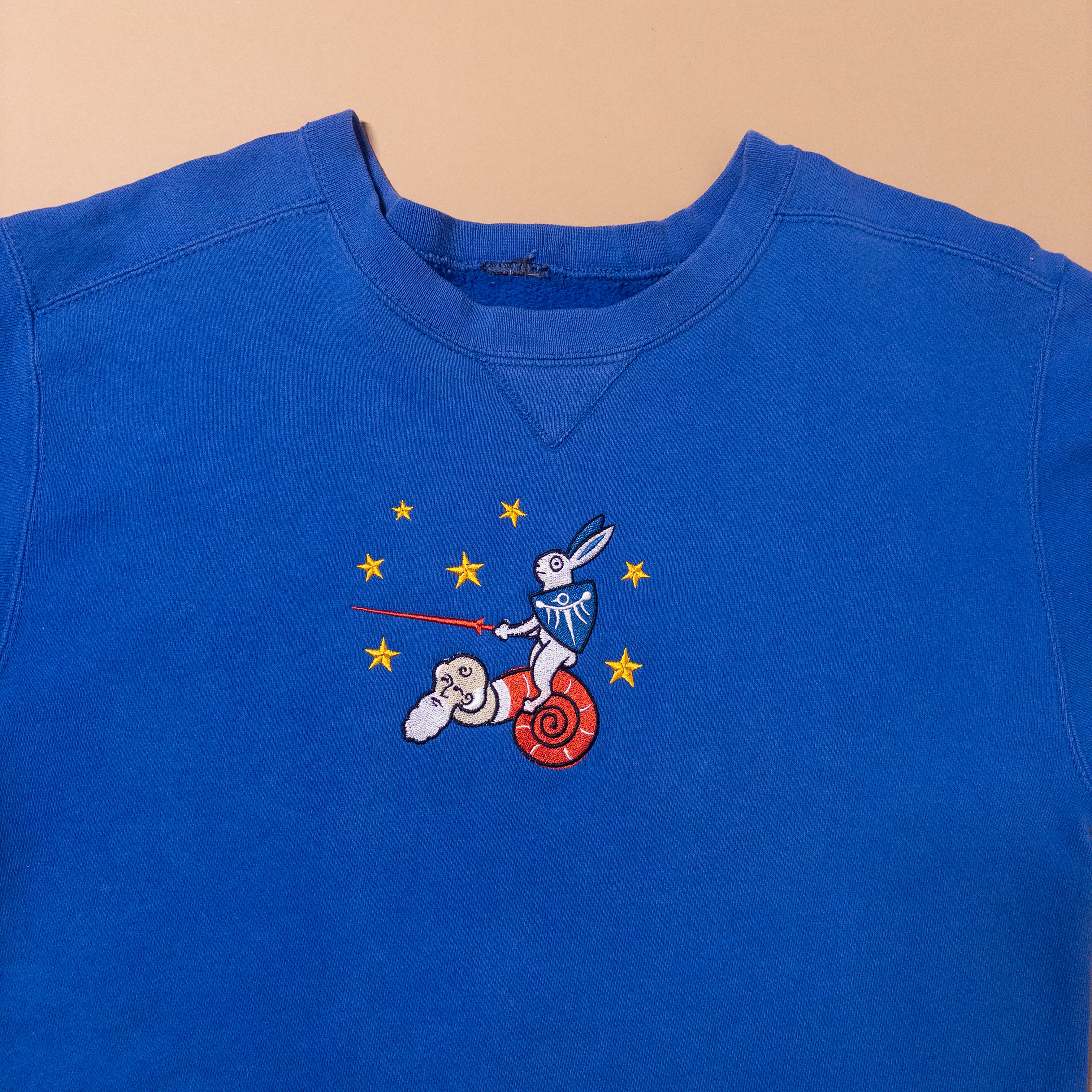 Medieval Rabbit Riding Snail Creature Crewneck Sweater in Light Blue