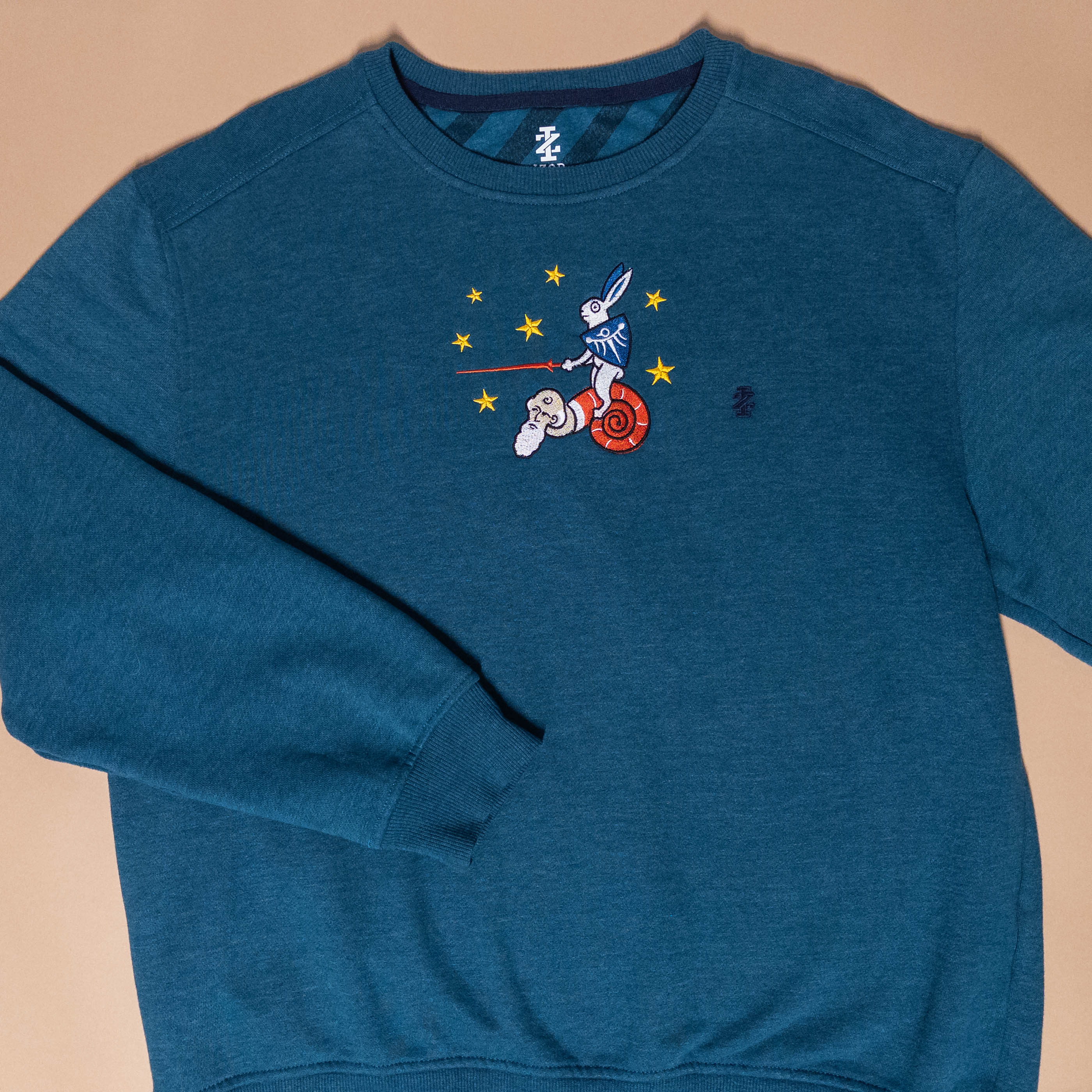 Rabbit Riding Snail Medieval Crewneck in Teal